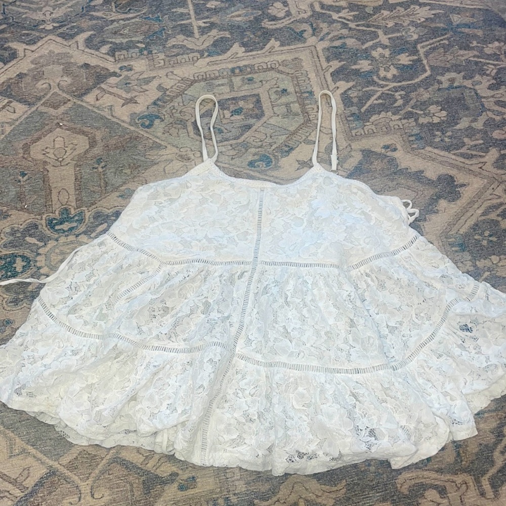 Loose white lace top